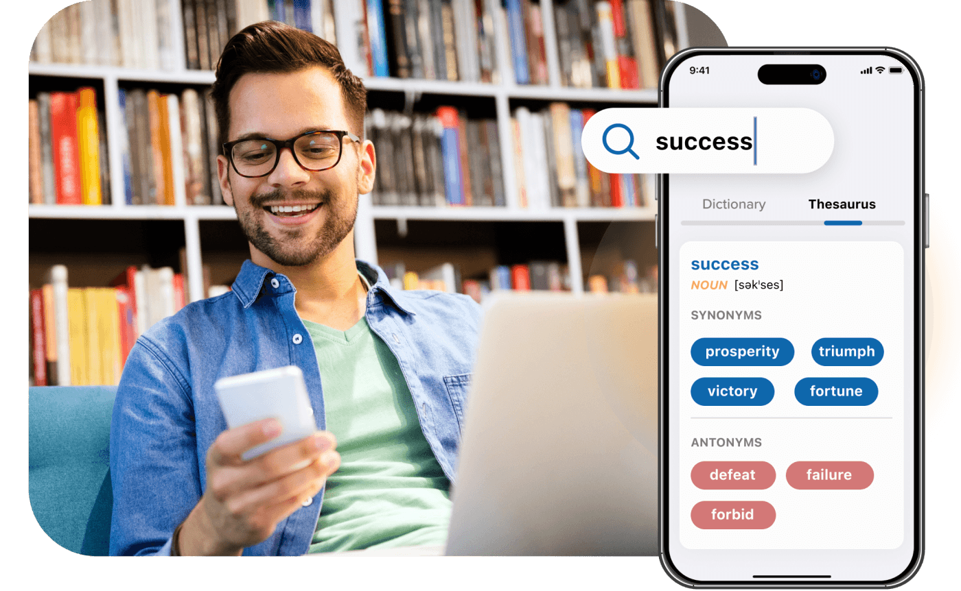 Man smiling while using a smartphone, seated with a laptop; bookshelf background. Nearby, a phone screen shows a thesaurus entry for "success" with synonyms: prosperity, triumph, victory, fortune; antonyms: defeat, failure, forbid.