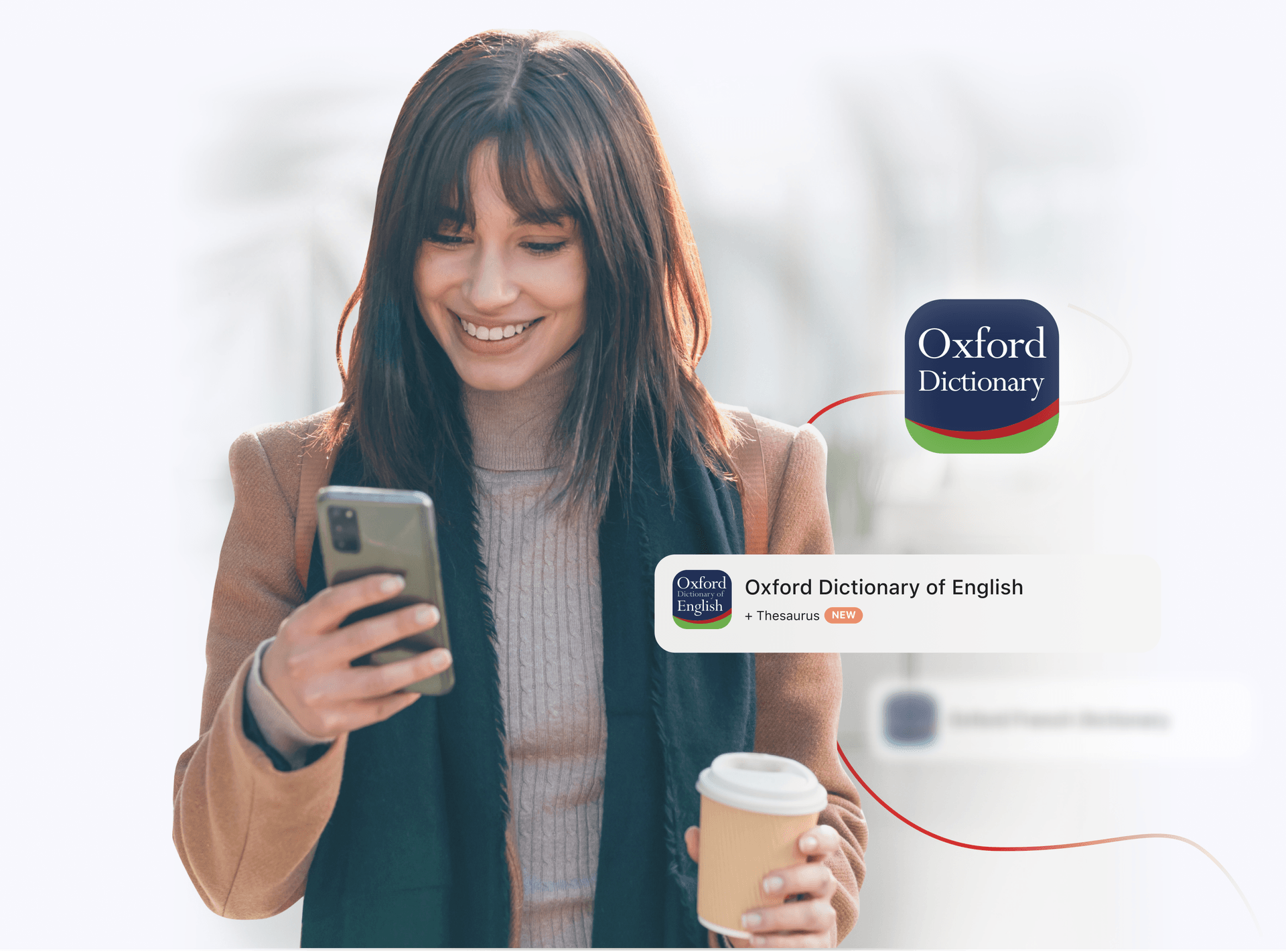 A woman smiles while looking at her phone, holding a coffee cup in a bright, blurred urban environment. The Oxford Dictionary logo is displayed nearby.