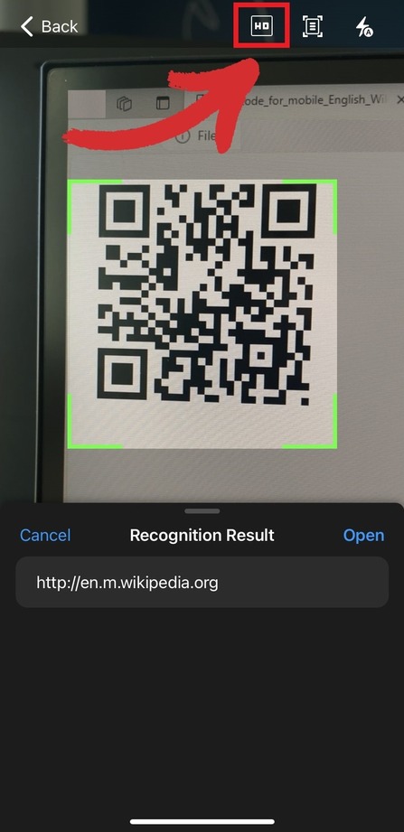 Scan your QR code by pointing at it and keeping it within the green borders.