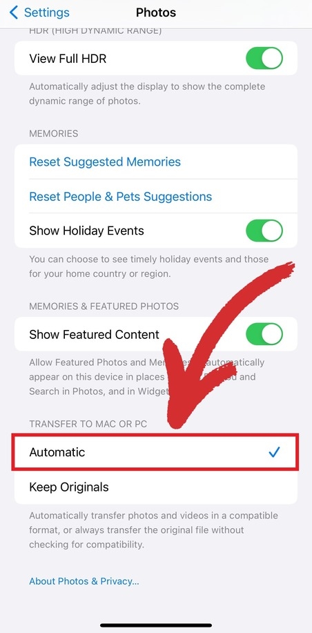 From your iPhone's "Settings", choose "Automatic" to seamlessly transfer photos and videos to other devices.